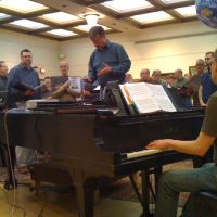 TCGMC Artistic Director Stan Hill working the CD player